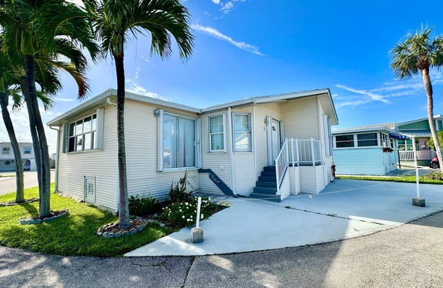 2-bedroom, 2-bathroom home is situated on a prime corner lot