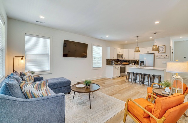 2 Mi to UT: Modern Retreat w/Covered Porch