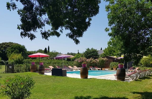 2 people standing cottage with garden pool