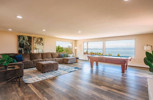 3300 sq ft beach house with amazing water view, hot tub,and private beach access