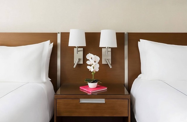 4 Double Queen Rooms at The Altair Hotel Bay Harbor Miami, Pets Are Welcome!