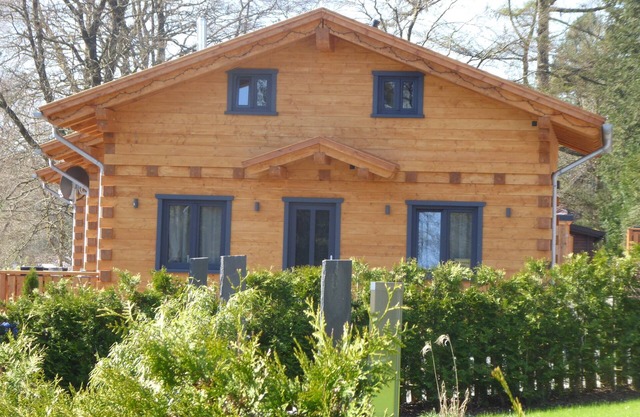 5 * log cabins with sauna, fireplace, terrace, barbecue etc. in alpine chalet style