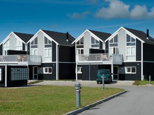8 person holiday home on a holiday park in Løkken