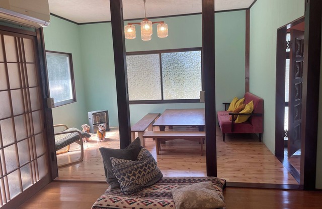 A 45-year-old private home with a family of five and two small dogs, located in a rich natural setting.