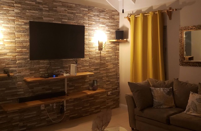 A home away from home is a villa located in a quiet gated community in St Ann.