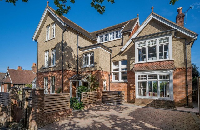 A large detached house with sea view that sleeps 12 guests in 6 bedrooms