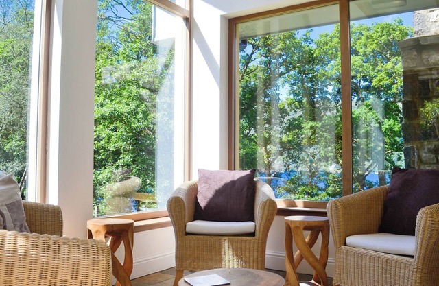 A large, detached property overlooking Loch Riddon on the Cowal Peninsula.