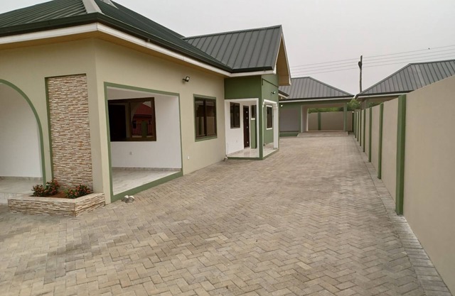A luxury home with boy's quarters & security cameras in a gated community