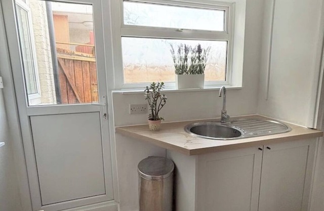 A modern spacious 3-bedroom apartment with garden