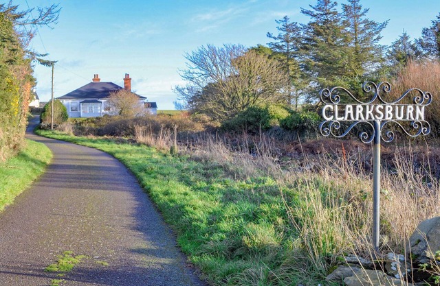 A superb 4 bedroomed cottage with glorious gardens and stunning sea views.