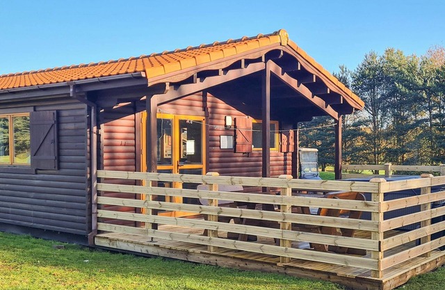 A three bedroom lodge with a master bedroom served by an en-suite shower room, two further twin bedr