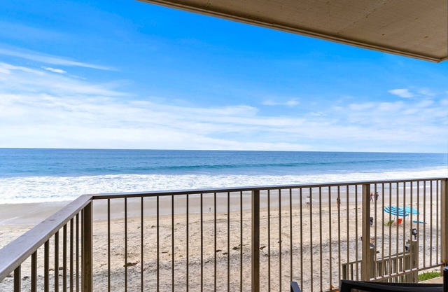A Wave from it All Toes-in-the-sand at A Wave from It All Beachfront Bliss