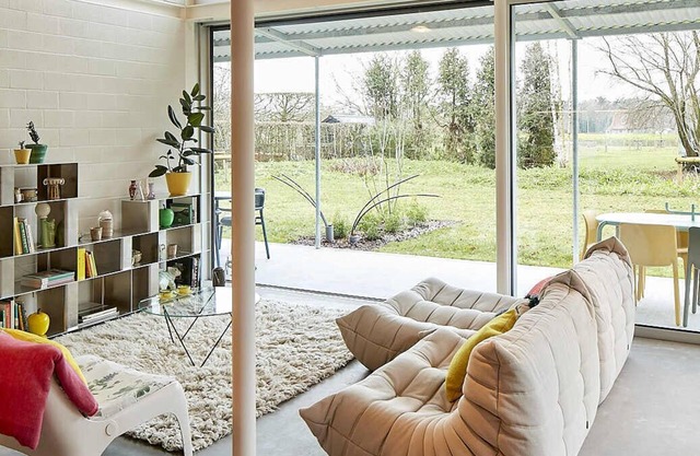 An Architectural Home with Panoramic Views, Color Accents, and a Warm Design.