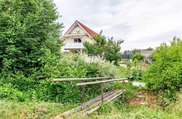 Apartment 'Beutenmühle Straussenfarm Erdgeschoss' with Private Terrace and Shared Garden