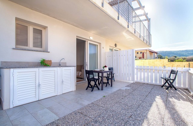Apartment 'Borgo Degli Ulivi' with Private Garden and Air Conditioning