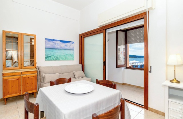Apartment "Casa Spiaggia Molo 1" on Isola Rossa with Sea view & Balcony