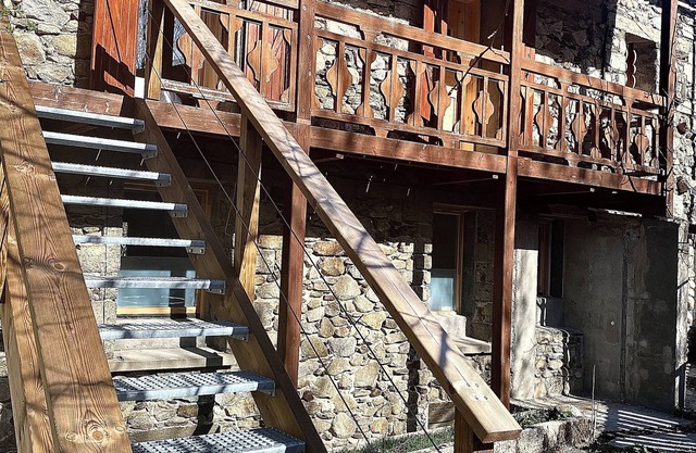 Apartment in renovated stone house with view and small garden