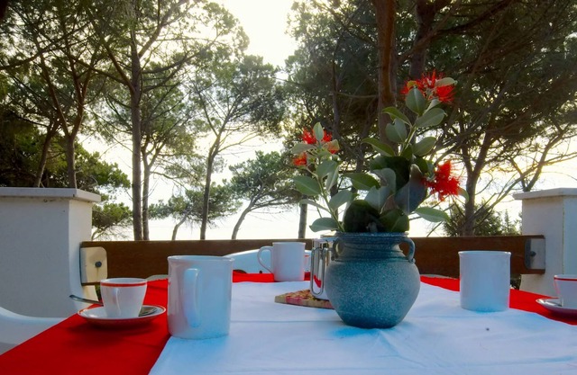Apartment in villa in Cala Liberotto directly on the beach.