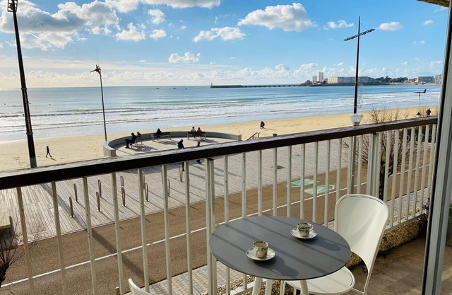 Apartment with direct beach access, balcony, and private garage