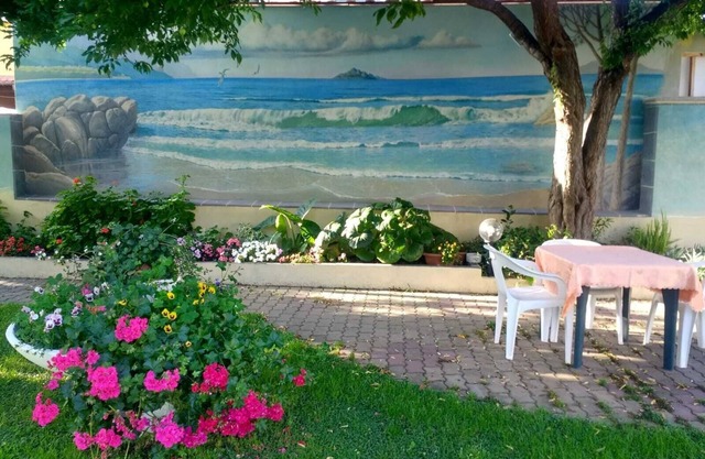 Apartment with panoramic veranda, equipped garden Arbatax area