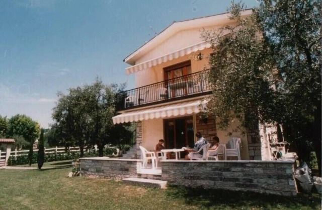 Apartment with sun terrace, large garden, communal pool, bathroom and guest WC