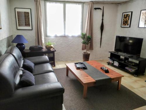 Appartement 55 m2 proche commerces et parking