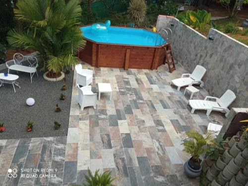 Appartement cosy à Le Morne-des-Esses, 37 m², piscine