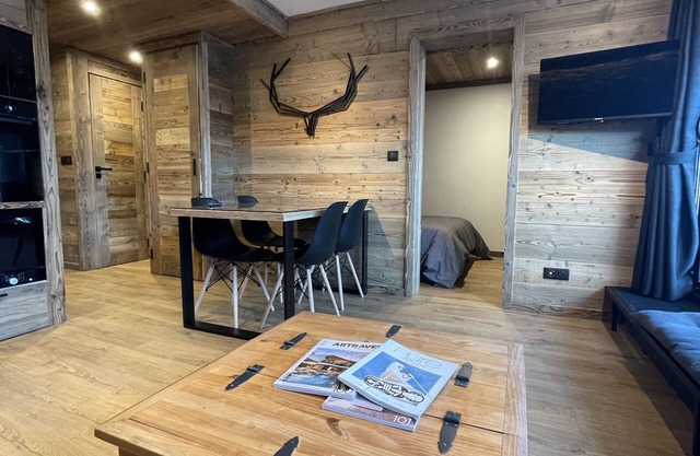 Appartement Luxe Style Chalet Exposition sud Garage Privatif Ski au Pied