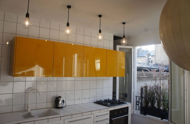 Architect's apartment, sunny, cozy and designated with a view over the roofs.