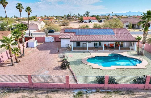 Arizona City golf course home with pool and RV parking, pets allowed!