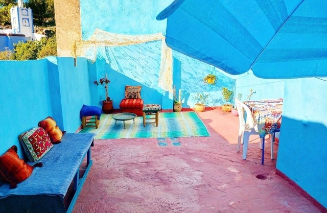 Artistic traditional Riad at the gate of the medina,panoramic mountains terrace