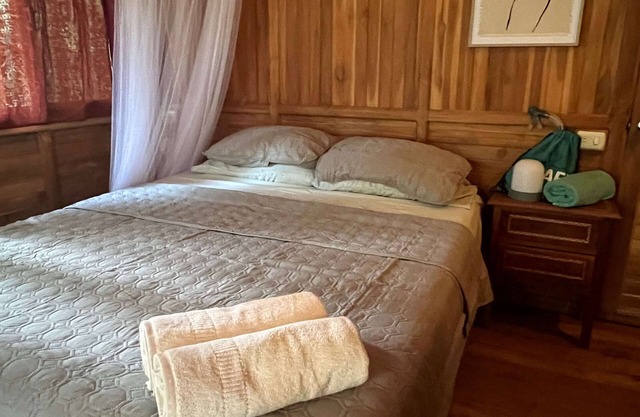 Balcony Room– Peaceful Stay Near Beach & Town