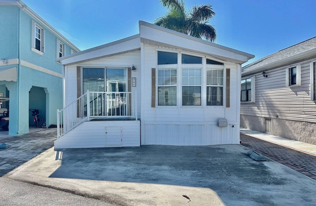 Beach Access home features an open floor plan with 2 bedrooms in a resort community