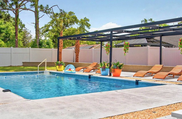 Beach Rental with Private Pool & Outdoor Entertainment for Up to 12 Guests!