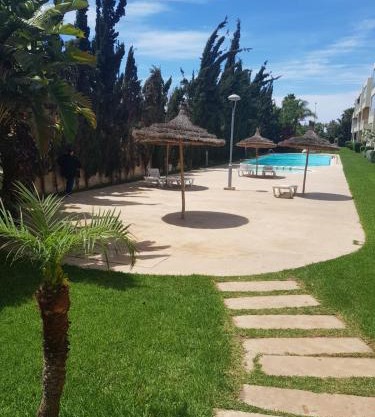Beach-Side 2-BR Oasis with Private Pool & Parking