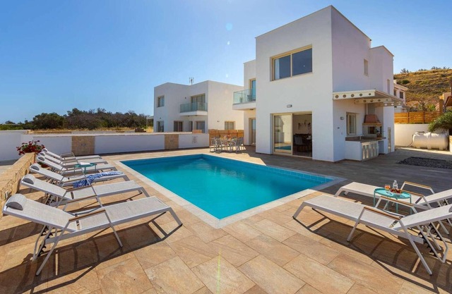 Beachfront 4 bed villa with sea views.