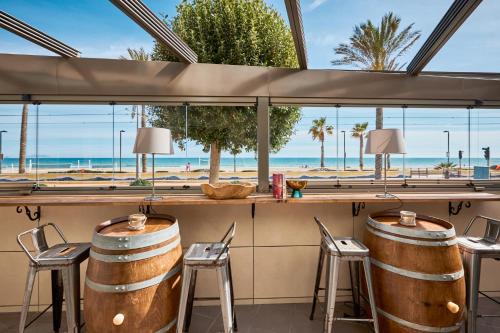 Beachfront apartment with private Taberna - By Welcomely