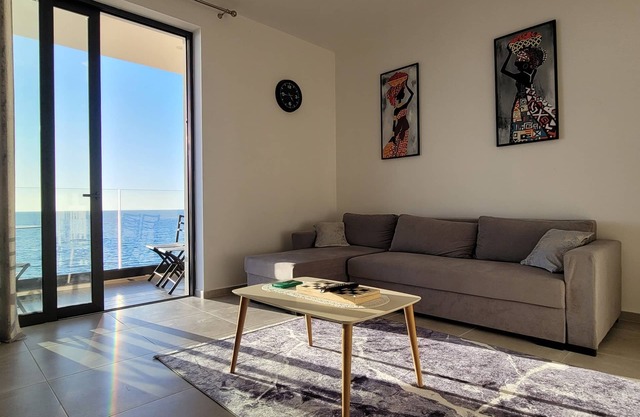 Beachfront Apartments with Stunning Sea View and Private Balcony.