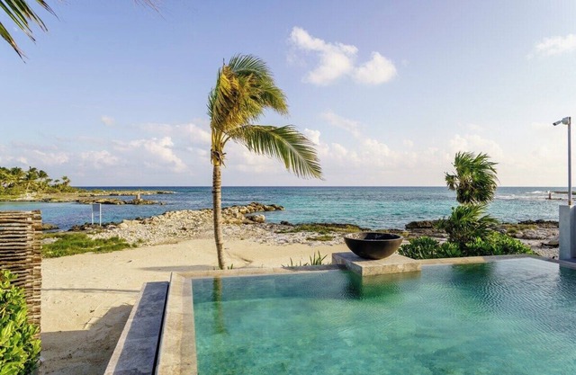 Beachfront Designer House in Private Development with Private Pool and Full Staff