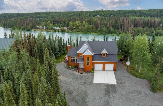 Beautiful 4 Bedroom Home secluded on the Kenai River with improved road access