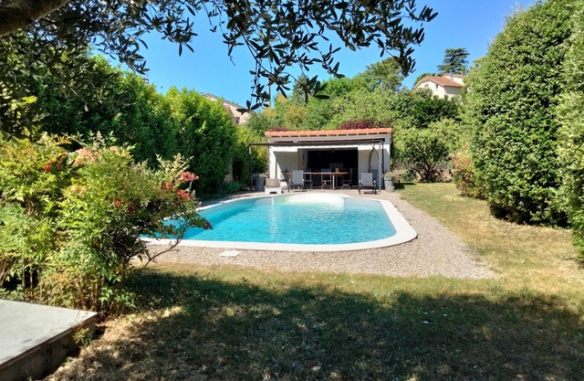 Beautiful apartment in a wooded garden by a swimming pool