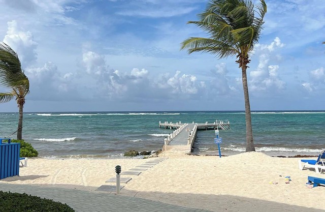 Beautiful beach front spacious studio apartment with private oceanfront patio.