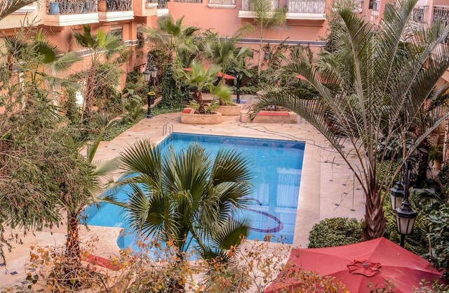 Beautiful, great equipped 122 m holiday apartment near Majorelle Garden and Gueliz with pool views and a large balcony and terrace