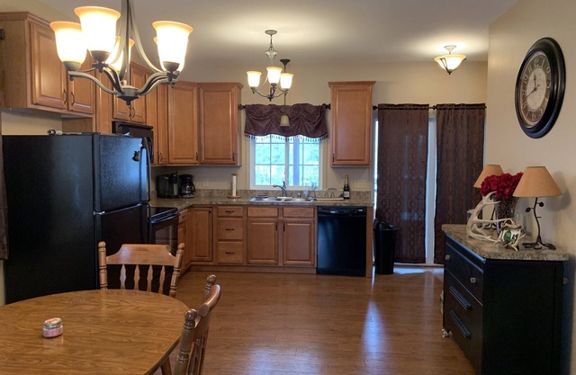 Beautiful Two story camp with Lake access, Full bar and Pellet fire place