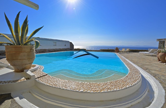 Beautiful waterfront Villa Christina with a swimming pool, sea and sunset view