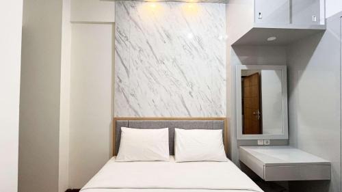 Best Price 2BR Apartment Vida View Makassar By Travelio