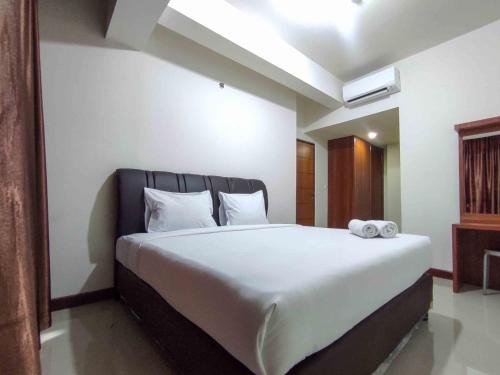 Big and Comfy 3BR at Vida View Apartement By Travelio