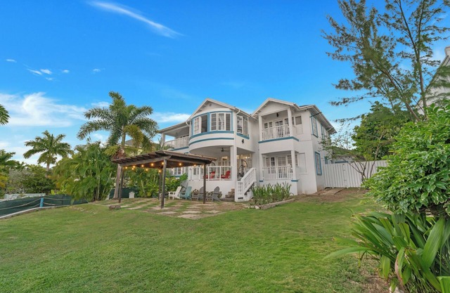 Breathtaking Villa with ocean views, hot tub, BBQ, and steps from the beach