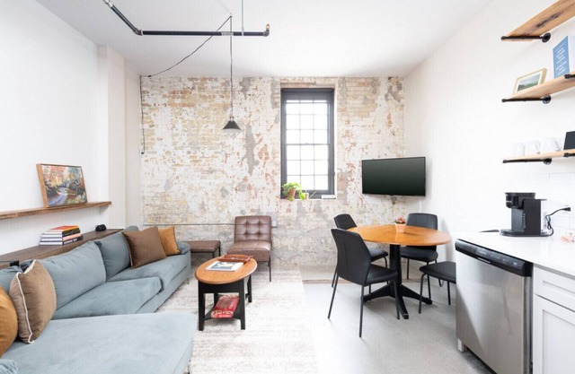 Brewery District 2-Story 2BR Apt Near Fiserv with Rooftop, Gym, and Parking