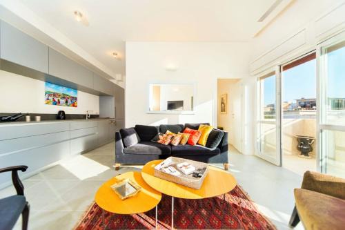 Bright 1BR Apartment w Balcony 10 min Walk from Beach with Mamad by Sea N' Rent